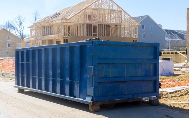 dumpster in driveway for renovation